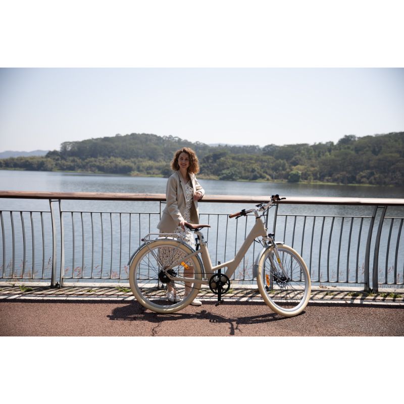 ADO Air 28 Pro - Urban Step Through All-Rounder Electric Bike - Woman Standing with Latte model